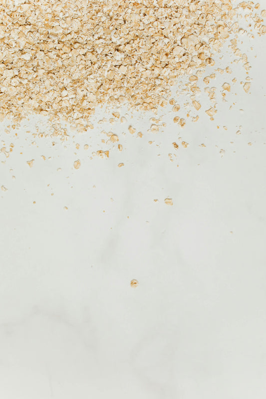 oat flakes on a white marmoled surface