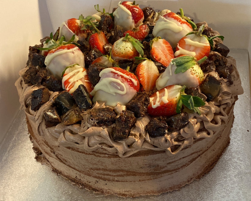 Triple Chocolate Caramel Brownie With Strawberries Cake